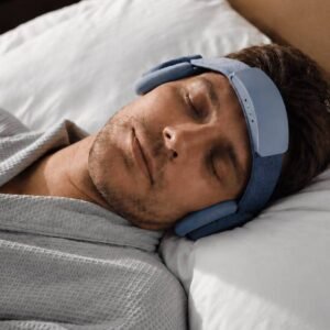 LumiSleep D1 headband worn while resting on a pillow